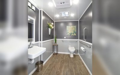 The Assistant features ADA accessible features such as grab rails, optional wheelchair ramp, and hands free flushing porcelain toilets