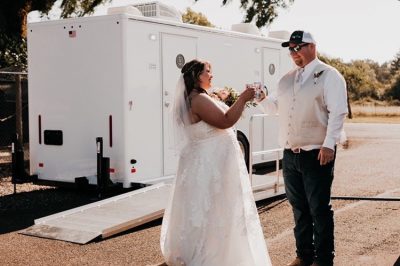 The Assistant restroom trailer at a wedding